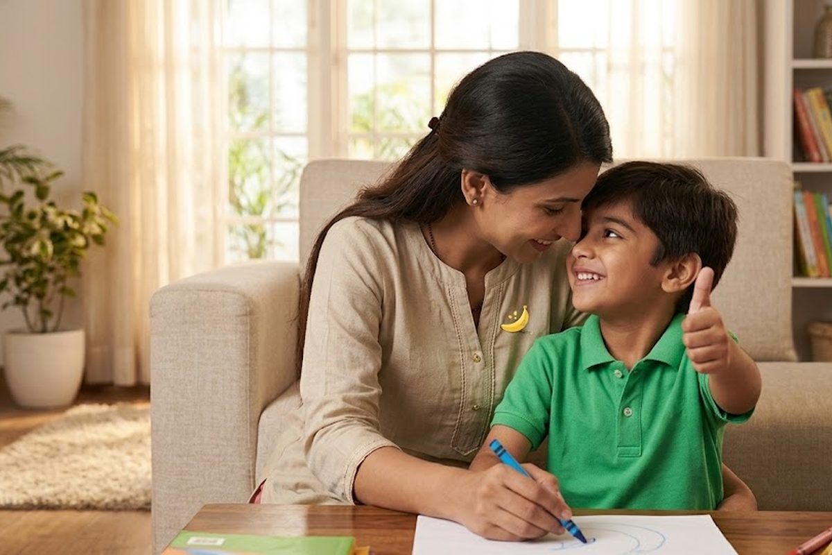 A mother and her young son drawing together at home